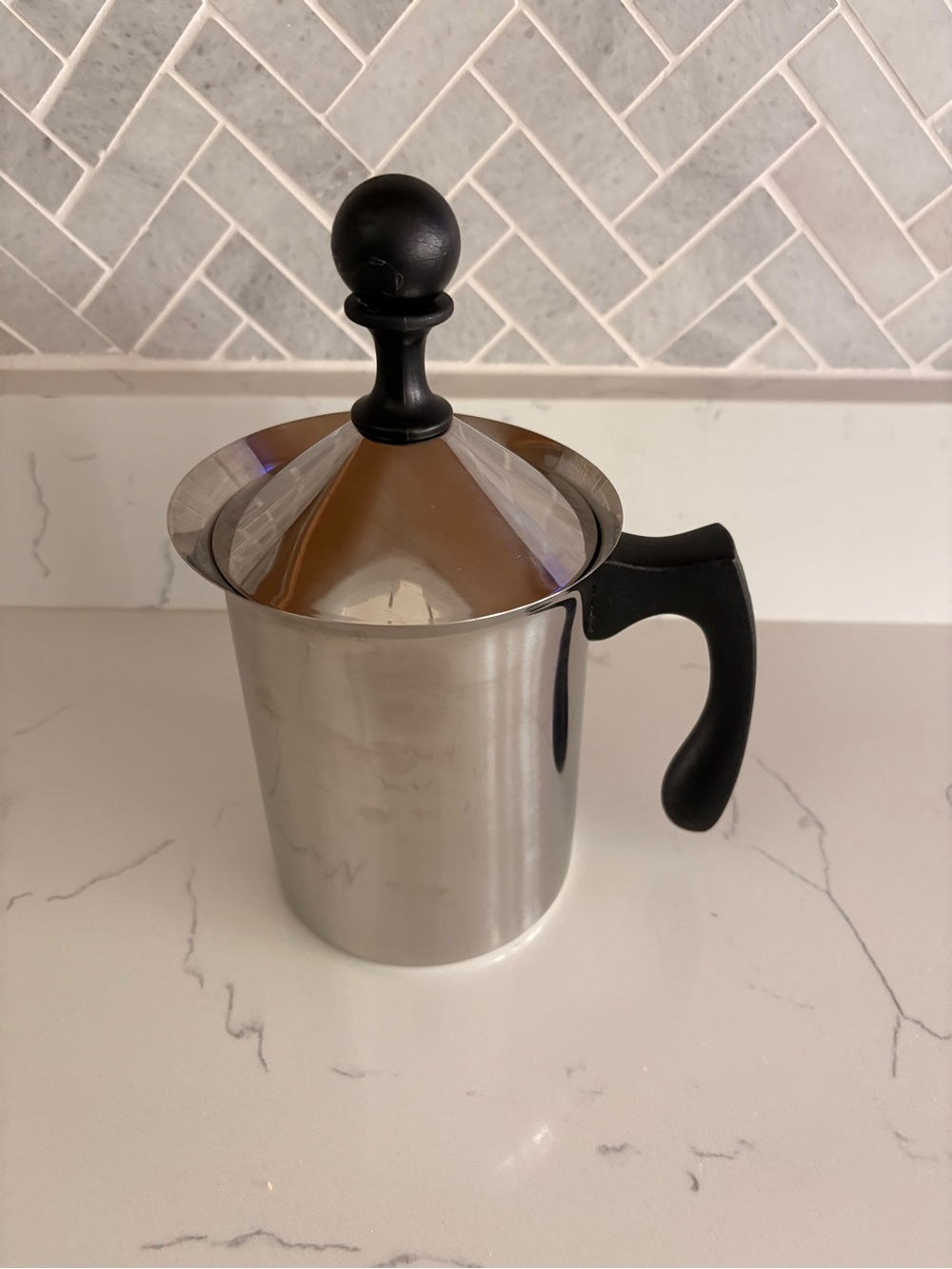 Stainless Steel Milk Frother Pitcher with Black Handle and Lid Knob